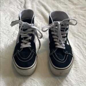 Vans Black and White High-Top Sneakers Classic Skate Design